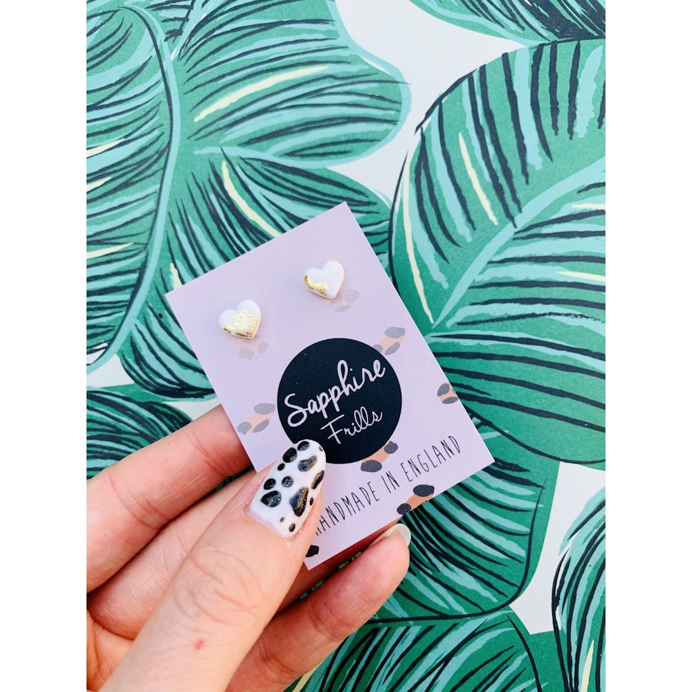 Sapphire Frills Mini White And Gold Heart Stud Earrings